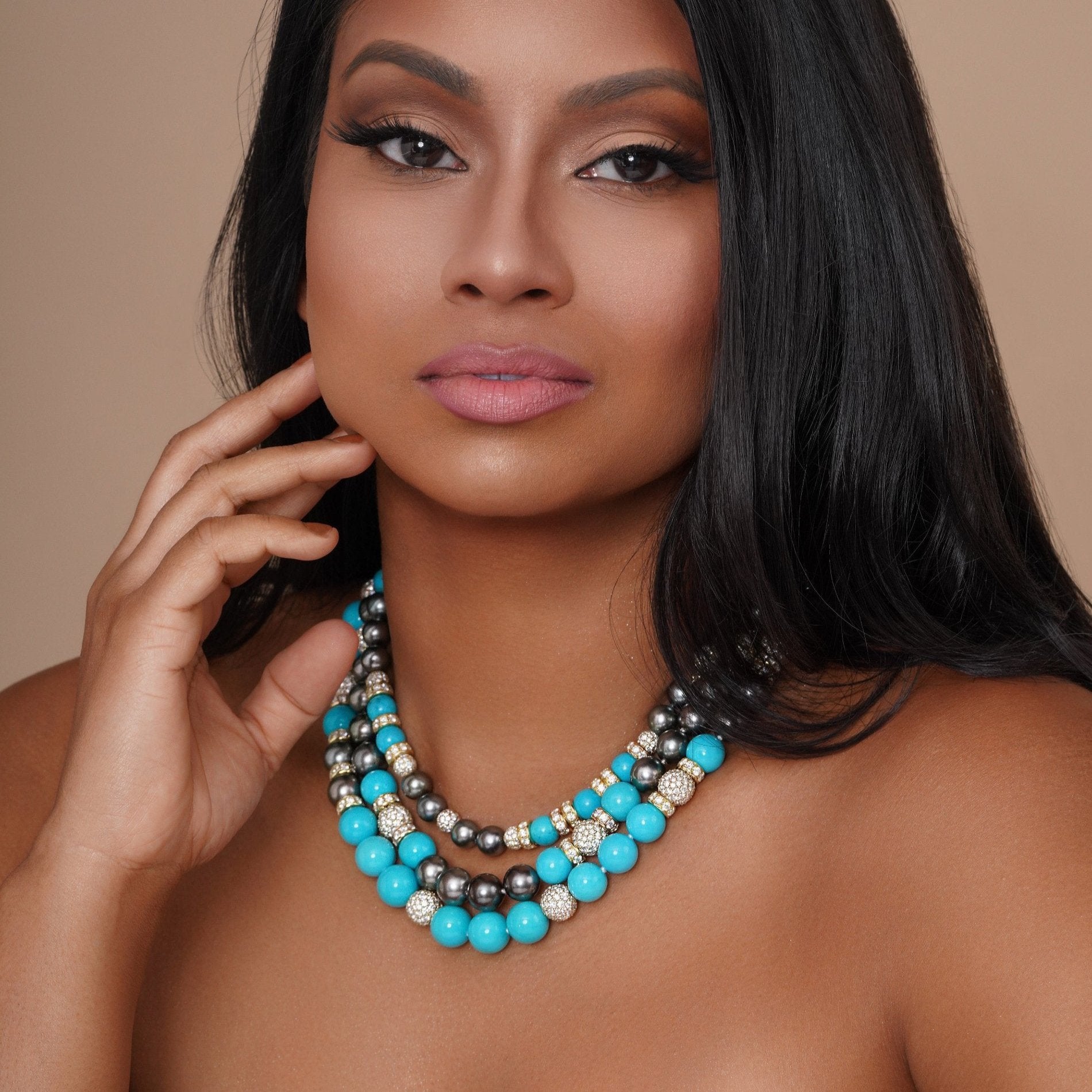 Gold, pearls, and color with presence.